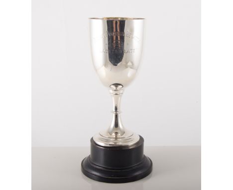 Silver presentation pedestal cup, Burton on Trent, and a Georgian silver punch ladle with a twisted whalebone haft, (2).