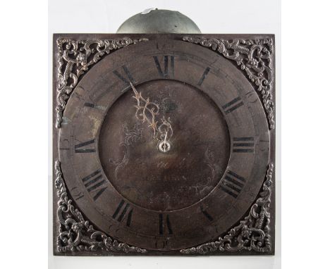 A dial, movement, weight and bob from pendulum, from a longcase clock, the metal dial having a roman numeral chapter ring, sp