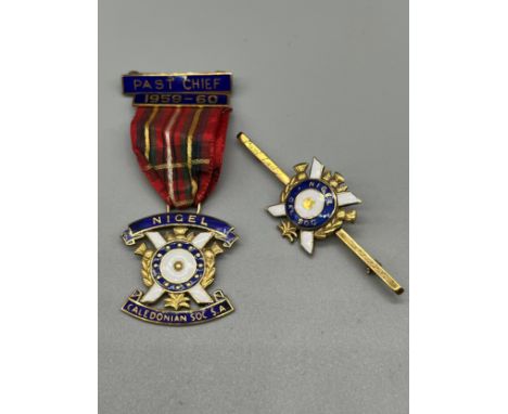Two 9ct and enamel Scottish medals for Nigel Caledonian Society. [20.31Grams] 