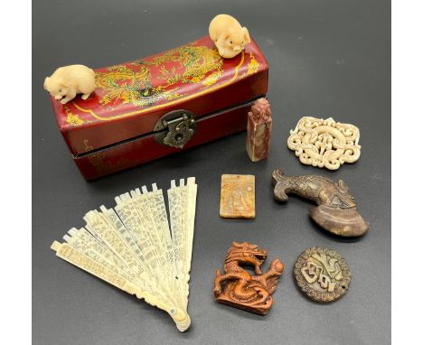 A Quantity of Chinese hand carved jade and netsuke items, Includes two tagua nut carved pig netsukes, both signed and fitted 