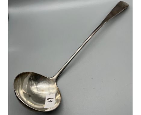 A Scottish George III soup ladle Fraser Howden, Edinburgh 1802, Scottish pointed end, engraved crest, length 39cm [241grams]“