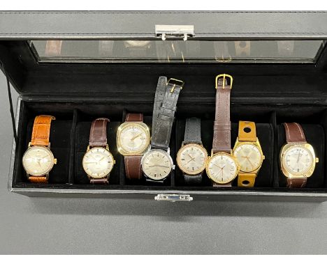 GARRARD - A gentleman's wristwatch, Silvered dial with sweep second hand and date, leather strap, manualRYTIMA, AUDEX, LIMIT,