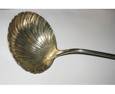 A George III soup ladle London 1758,. Probably Thomas and William Chawner, Old English, engraved crest, large shell shaped bo