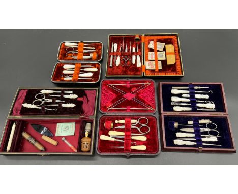 A Lot of cased/ boxed manicure/ sewing utensils. Includes mother of pearl handles tools and silver thimbles. [Will post] 