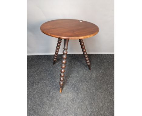 19th century table, the circular top raised by a trio of bobbin turned legs [61x51cm] 