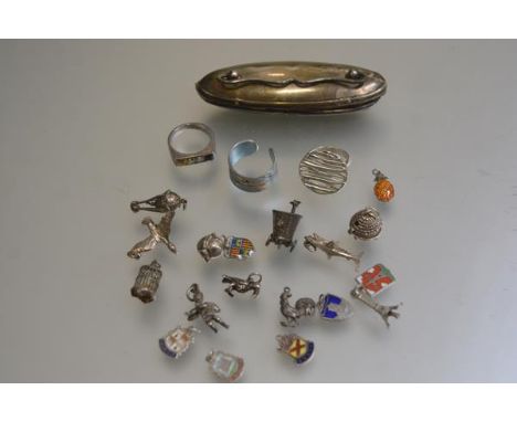 A Birmingham silver mounted nail buffer, a white metal gem set ring, a titanium ring, a white metal ring, a collection of mis