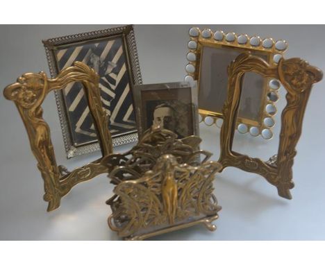An Art Nouveau style brass two division letter rack of female form design, a pair of brass Art Nouveau style cast photograph 