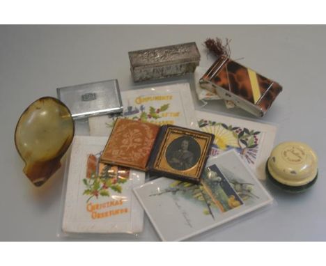 A collection of four various WWI greetings cards with Compliments of the Season etc., a lady's camera style compact, an antim