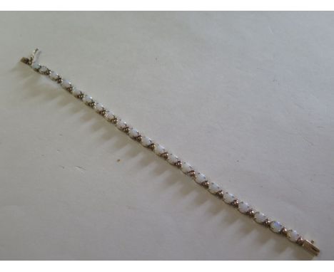 A vintage 9ct opal bracelet, total weight approx 6.1 grams 