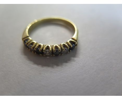 An 18ct gold diamond and sapphire set band or half eternity ring, size S, weight approx 4 grams, nice condition, light surfac