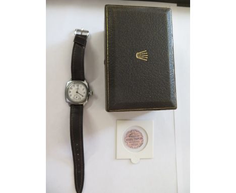 A rare 1930's Rolex Oyster wrist watch with cushion chromed case, screw down bezel and superb original dial, original screw d