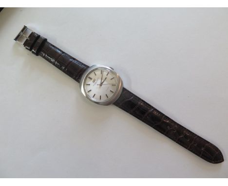 An interesting gents IWC automatic steel cased wrist watch, brushed steel tonneau style case, circa 1970's, watch accessed by