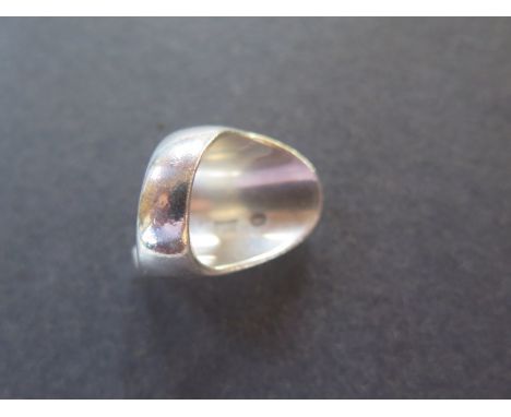 A Georg Jensen silver ring, no 140 - ring size M, approx 21 grams, marks consistent with use 