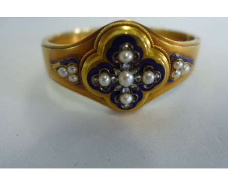 A very pretty Victorian diamond seed pearl and enamel gold hinged bangle, not hallmarked but tested as 14ct gold, set with tw