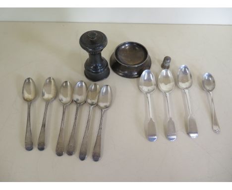 Ten silver teaspoons, a silver grinder and a weighted silver dish and thimble, weighable silver approx 5.3 troy oz 