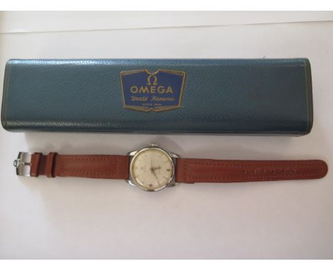 A superb 1957 Omega Seamaster bumper automatic steel case 33mm diameter, with light champagne dial, Arabic numerals at  3,6,9