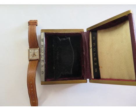 A Rolex 9ct light rose gold tank watch, circa 1920's, Arabic numerals to rectangular dial and showing some radium burn, 17 je