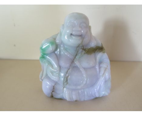 A lavender jade laughing Buddha, 9cm tall, in good condition 