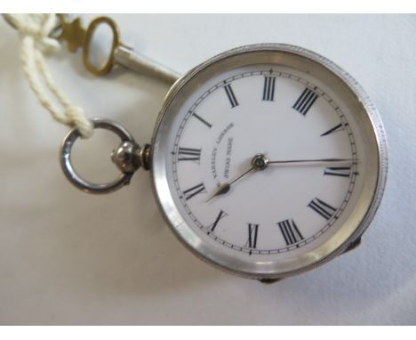 A ladies silver fob watch by J B Yabsley of London, white enamel face with Roman numerals, case width 38mm, stamped 935 with 