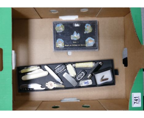 A collection of pocket knives : together with German enamel badges 