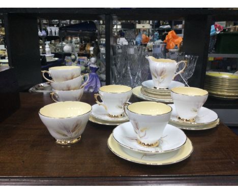 SUTHERLAND CHINA TEA SERVICE comprising 6 cups, 6 saucers, 6 side plates, sugar bowl, milk jug and cake plate (21)
