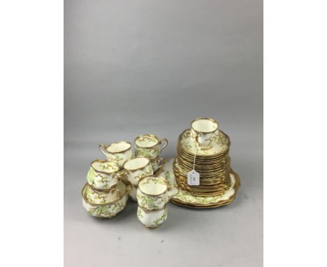 ROYAL ALBERT PART TEA SERVICE, with floral and gilt decoration, comprising 11 cups, 12 saucers, 12 side plates, sugar and 2 c