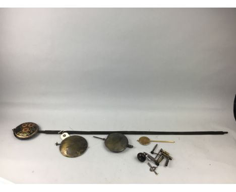 COLLECTION OF CLOCK KEYS, along with a two pendulumns and two bobs