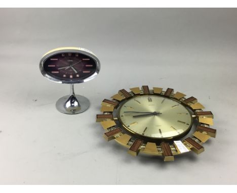 RETRO CORAL MANTLE CLOCK, 19.5cm high, along with a Metamech mantle clock (2)