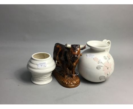 GLAZED POTTERY BULL, 21cm long, along with a group of ceramic vases, jug and a ceramic tile