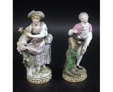 PAIR OF MEISSEN FIGURES late 19thc or early 20thc, model F68, modelled as a lady and gent with the lady holding a lamb and th