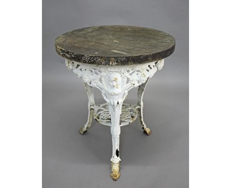 VICTORIAN CAST IRON GARDEN TABLE - W G GRACE a cast iron table with depictions of W G Grace on the top of each leg, with a sh