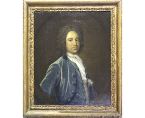 FOLLOWER OF JOHN VANDERBANK (1694-1739) PORTRAIT OF A GENTLEMAN Quarter length wearing a blue coat, waistcoat and white neckc