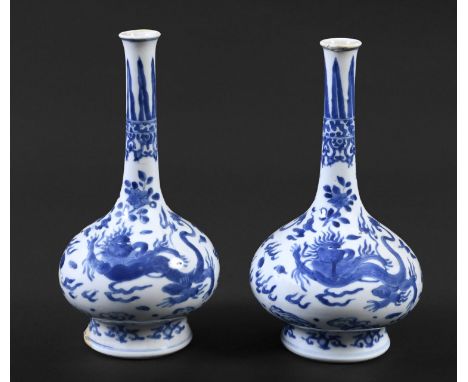PAIR OF CHINESE BLUE &amp; WHITE PORCELAIN VASES - KANGXI Qing Dynasty, Kangxi period, a pair of bottle shaped vases with lon