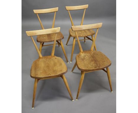 SET OF FOUR ERCOL STACKING CHAIRS a vintage set of four dining chairs with light elm seats and beech legs, the chairs stack f