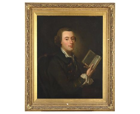 CIRCLE OF JOHN ASTLEY (1724-1787) PORTRAIT OF A GENTLEMAN Half length, seated, wearing a dark blue/green coat, holding a book