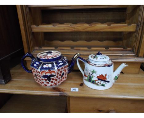 Derby pattern teapot and an Oriental teapot