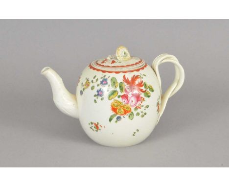 A Staffordshire creamware teapot and cover circa 1760, of globular form with intertwined handle and a floral finial to the th