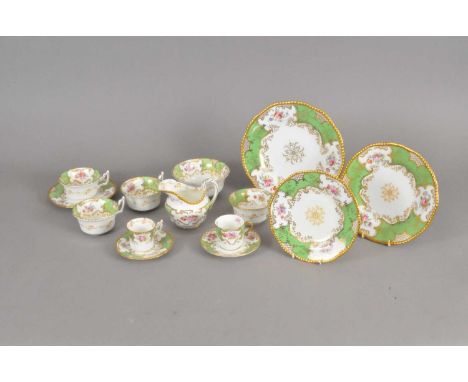 A Coalport 'Green Batwing' part tea service early 20th century typically printed and painted, the service comprising seven te