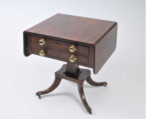 A William IV mahogany pedestal sofa table, on a quadrupled base with sabre legs, extended 112 x 56 x 70cm high