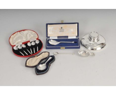 A cased set of six silver coffee spoons, Sheffield 1933, together with a cased Britannia standard silver 'Tudor Rose' seal to