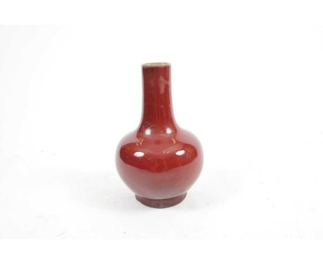 A Chinese song de boeuf type vase, of bulbous form, with drawn cylindrical neck, with impressed seal mark to underside, 25cm 