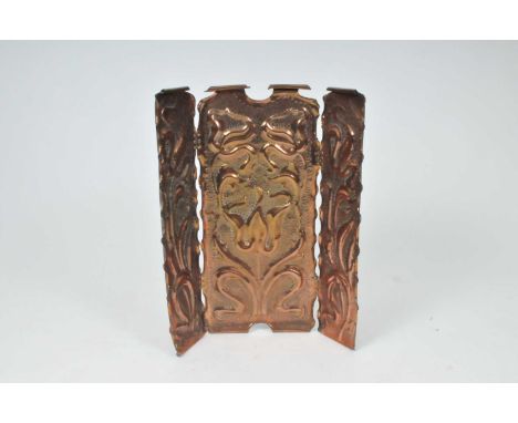 A late 19th century Arts &amp; Crafts copper three-divisional copper fire screen, in the manner of The Newlyn school, decorat