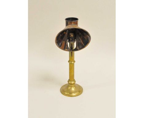 A brass student's lamp, Miller's of London, with a single burner 39 cm high.
