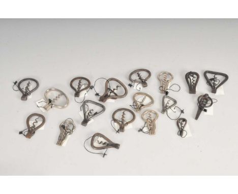 A collection of eighteen various bow-shaped folding singe tool corkscrews (18).