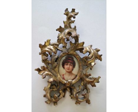 A Framed Miniature Portrait of a Young Lady with Red Hairband, signed Ezziole right edge, inscribed verso Florence, framed wi