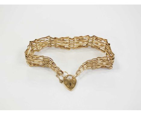 A seven bar gate link bracelet, hallmarked London 1987, with heart shaped padlock clasp, weight approx 9.4g