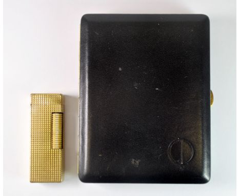 A cased Dunhill gold plated lighter and a Dunhill leather covered cigarette case.