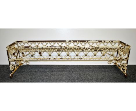 A vintage wrought iron planter frame, L. 109cm.