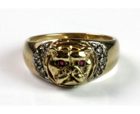 A 9ct gold pug dog ring set with ruby eyes and diamonds, (K).