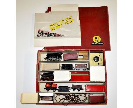 A vintage Trix 00 gauge railway set.